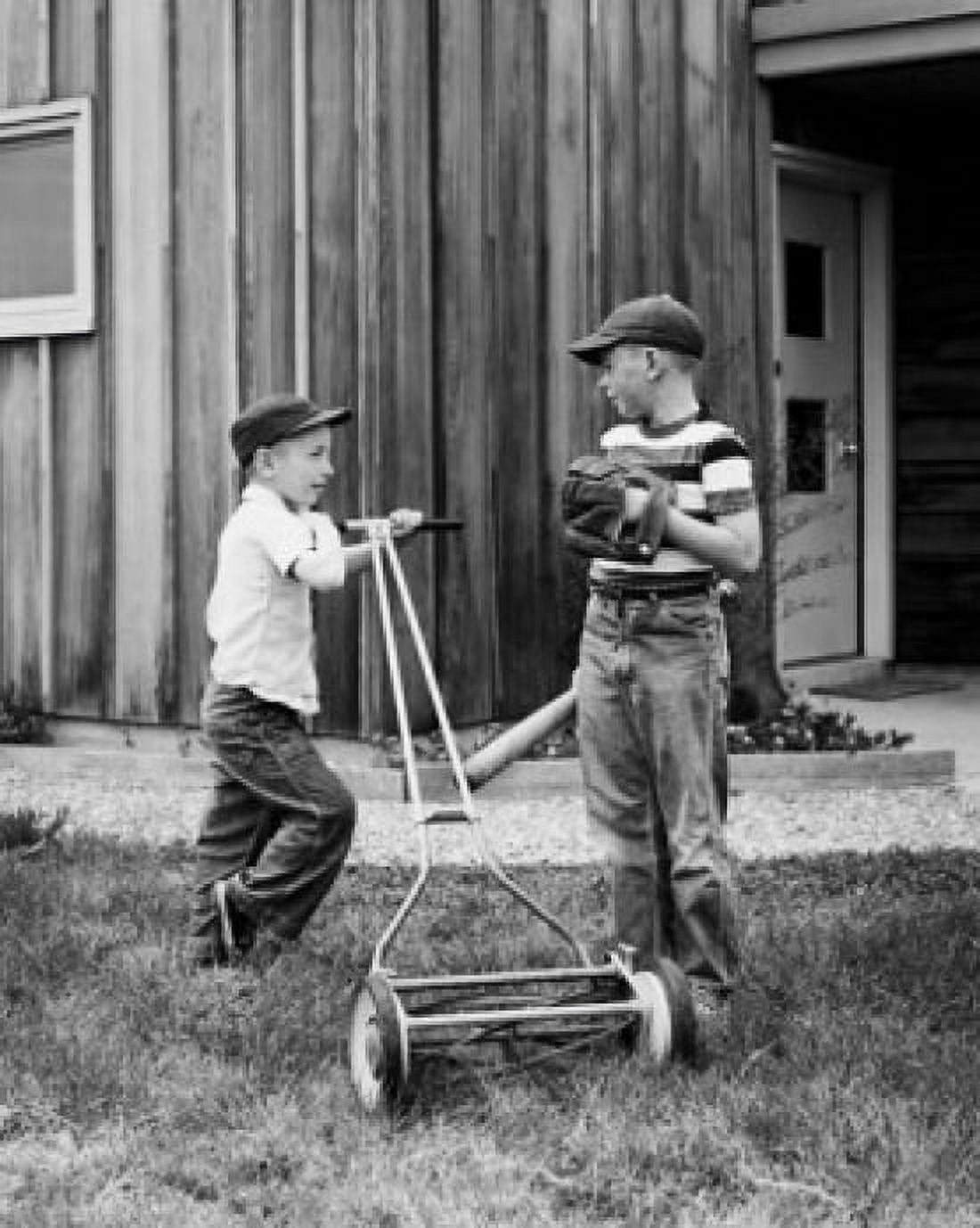 Boy mowing the lawn with a lawn mower and his friend talking to him Canvas Art - (24 x 36)