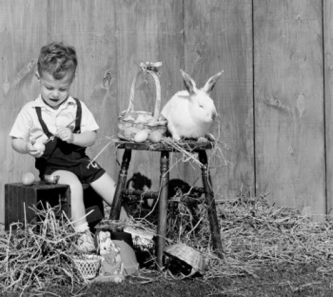 Boy painting easter egg Canvas Art - (18 x 24)