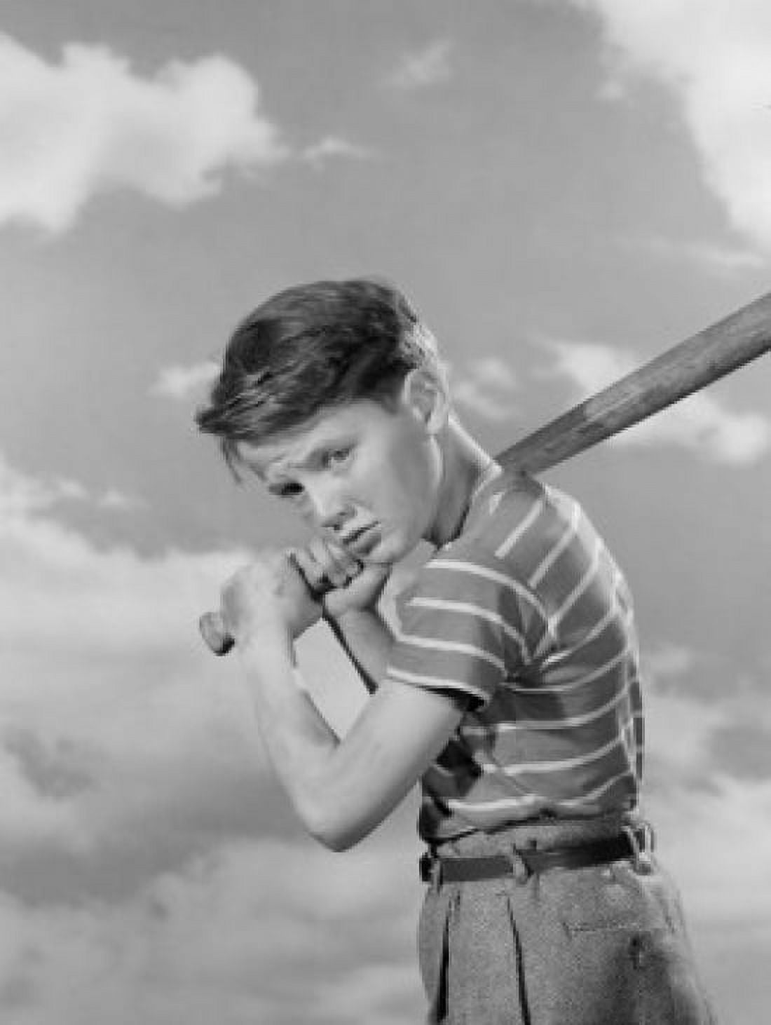 Boy playing baseball outdoors Canvas Art - (18 x 24)
