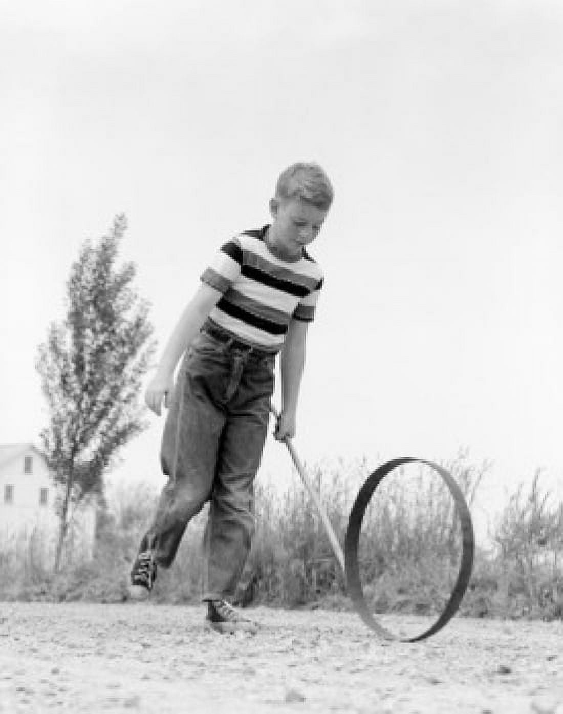 Boy playing outdoors Canvas Art - (24 x 36)