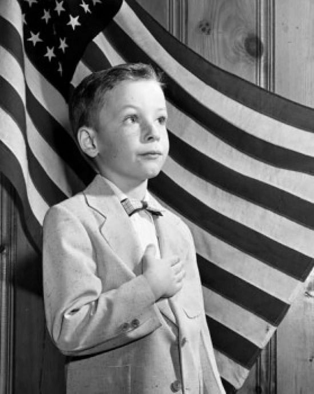 Boy pledging allegiance to the flag Canvas Art - (24 x 36)