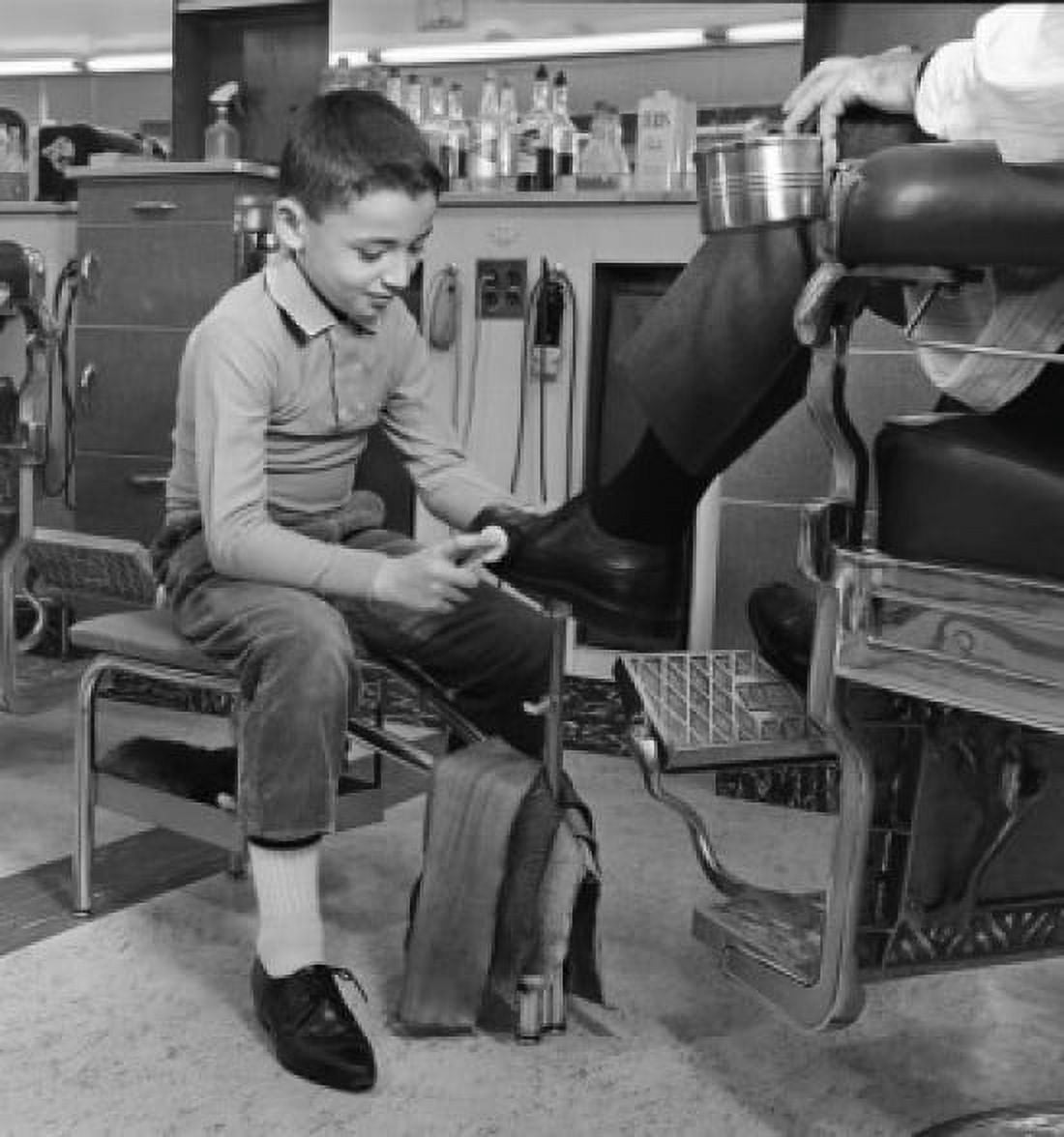 Boy polishing mens shoe Canvas Art - (18 x 24)