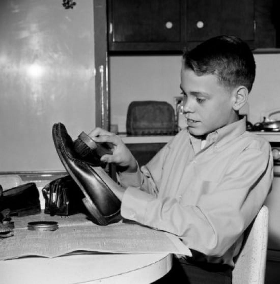 Boy polishing shoes Canvas Art - (18 x 24)