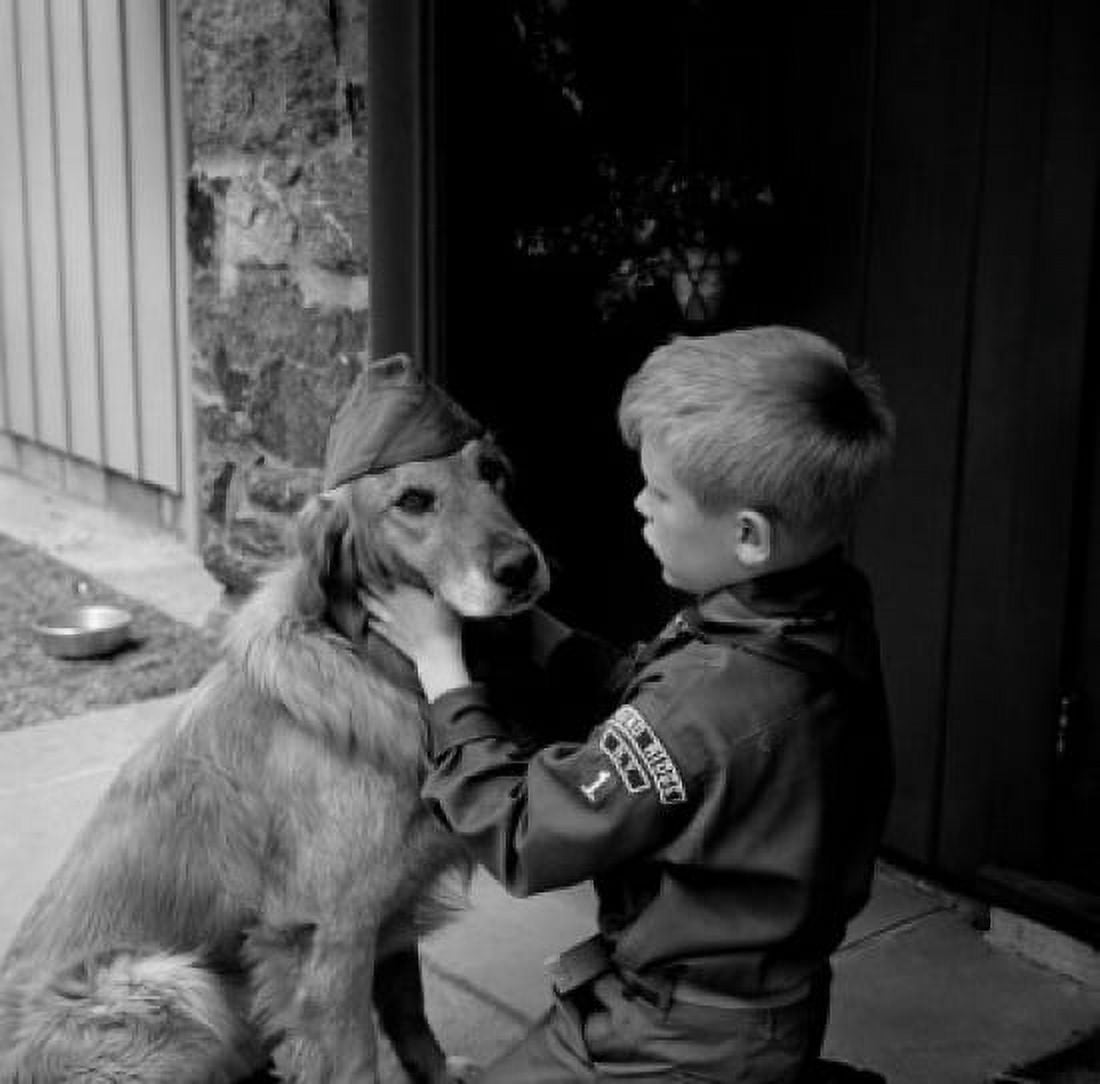 Boy scout in uniform with dog wearing scout hat Canvas Art - (18 x 24)