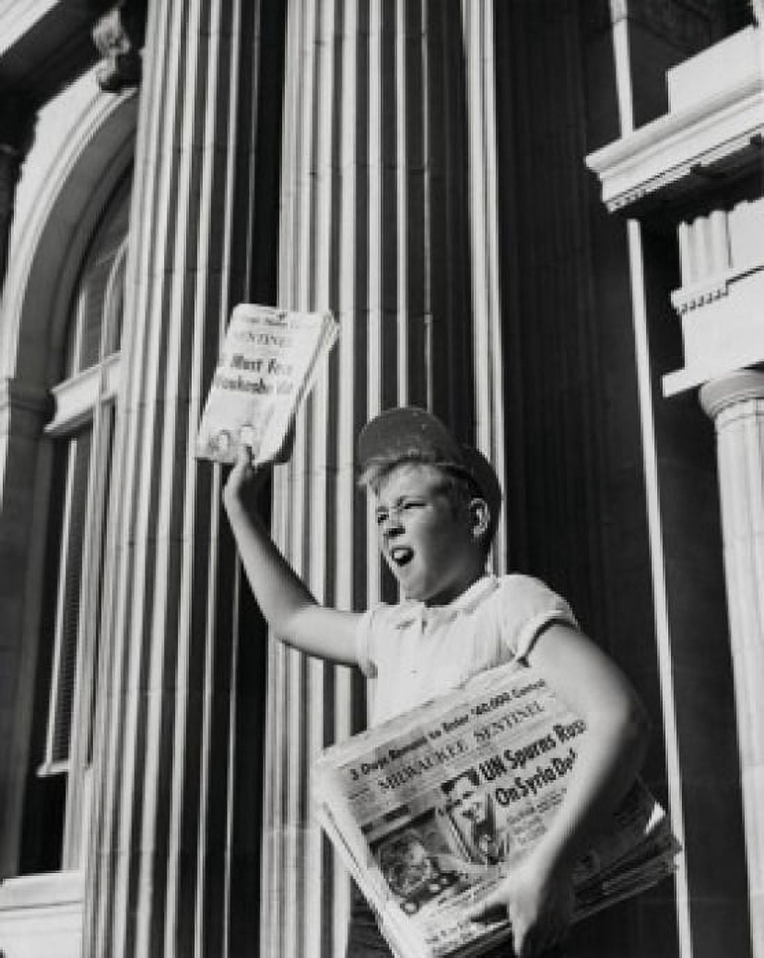 Boy selling newspaper in front of a building Canvas Art - (24 x 36)