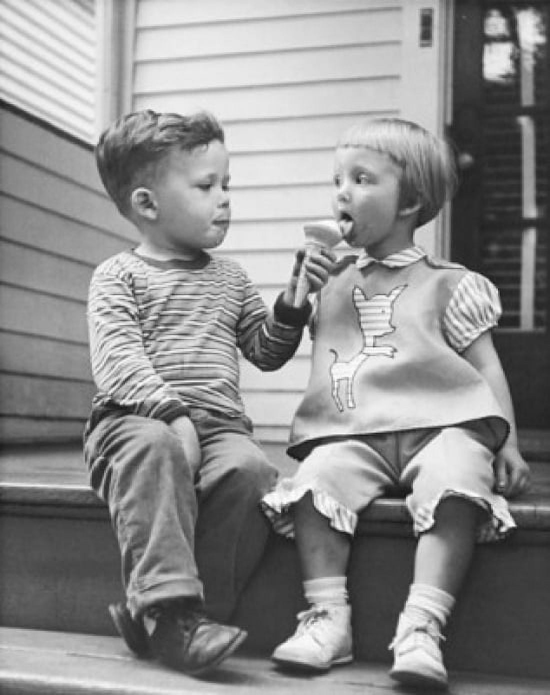 Boy sharing ice cream with a girl Canvas Art - (18 x 24)