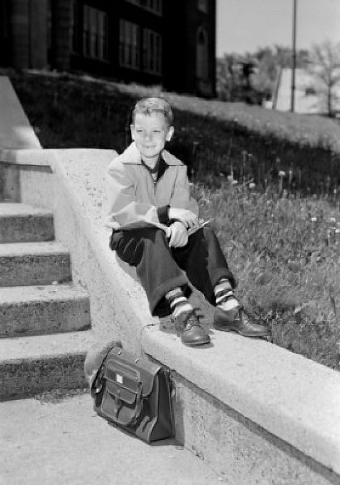 Boy sitting and looking away Canvas Art - (24 x 36)
