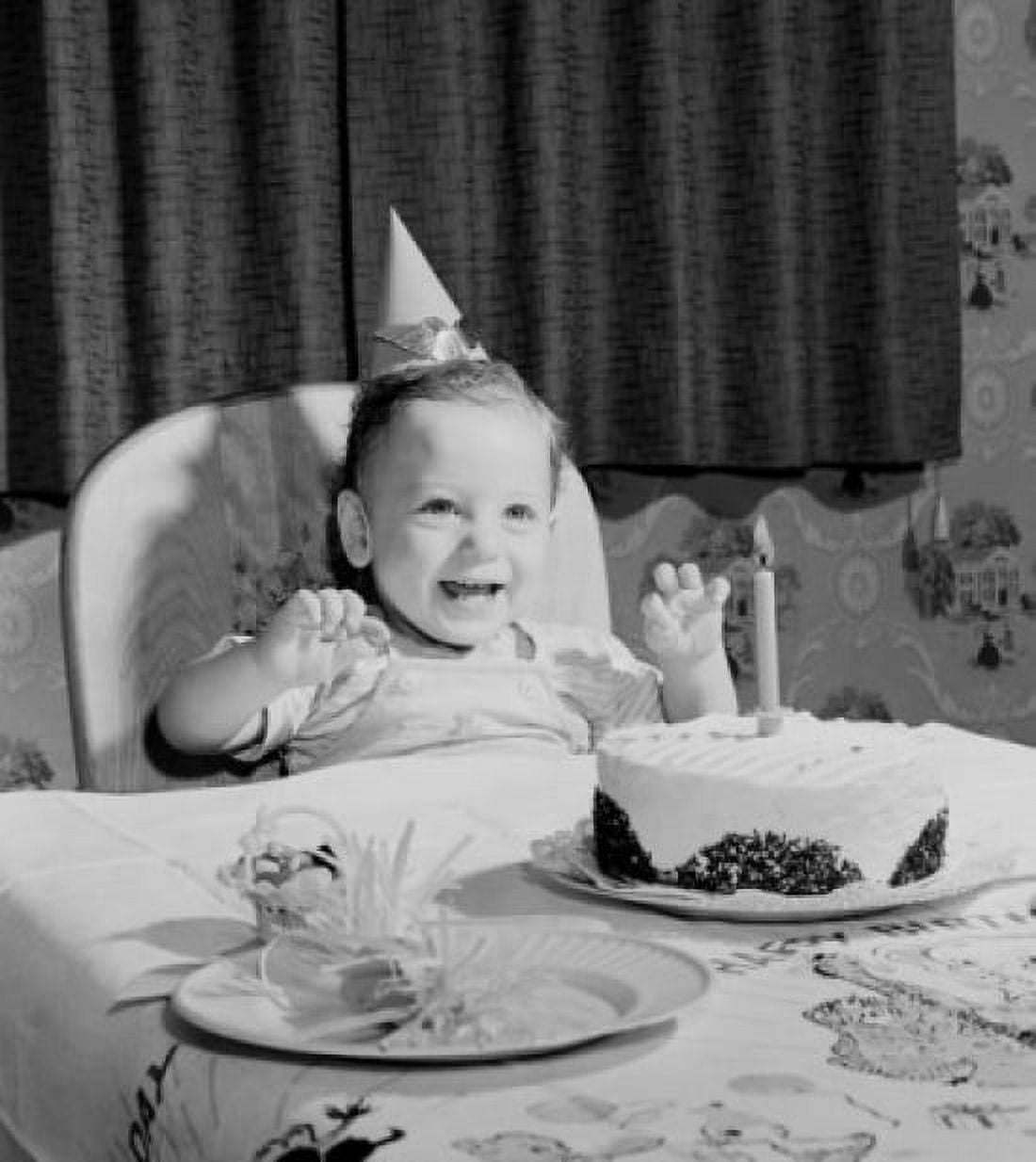 Boy sitting at table with birthday cake Canvas Art - (18 x 24)