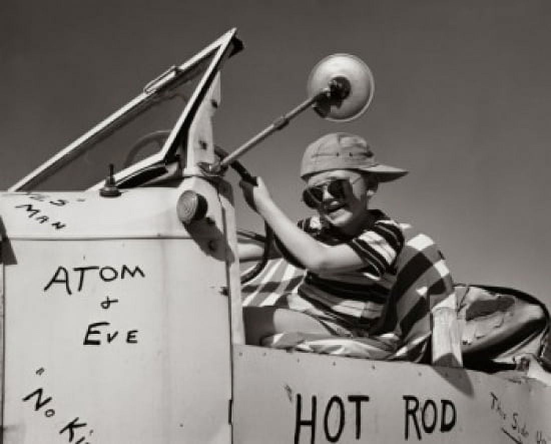 Boy sitting in the drivers seat of a car Canvas Art - (24 x 36)