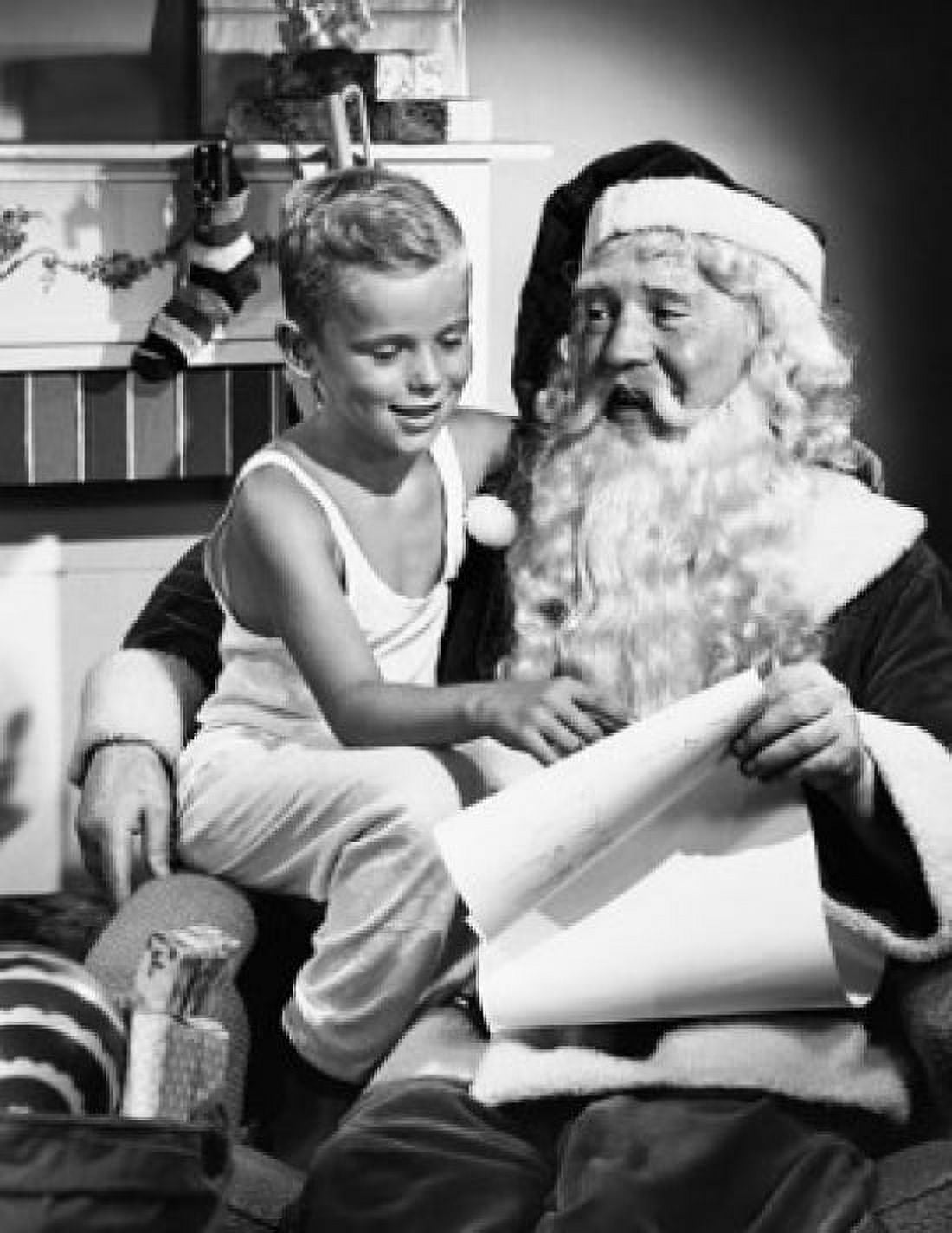 Boy sitting with Santa Claus and checking list Canvas Art - (24 x 36)