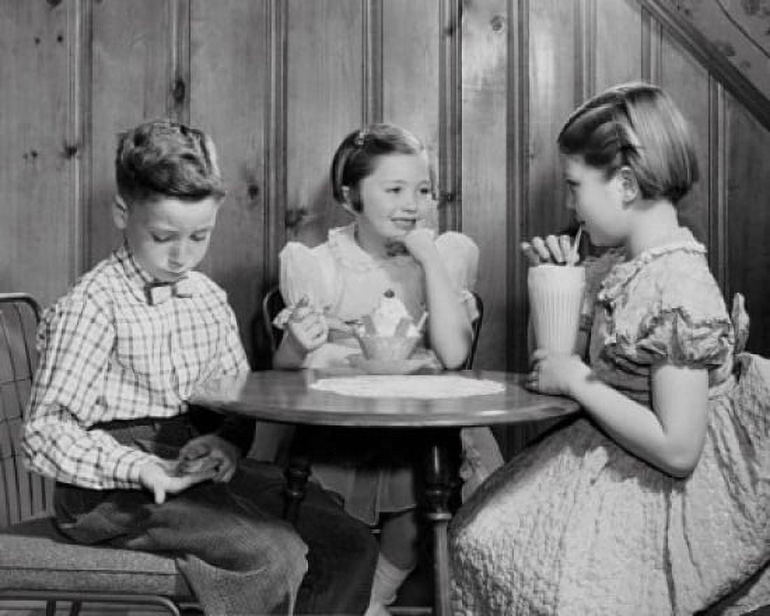 Boy sitting with two girls in a restaurant and counting money Canvas Art - (18 x 24)