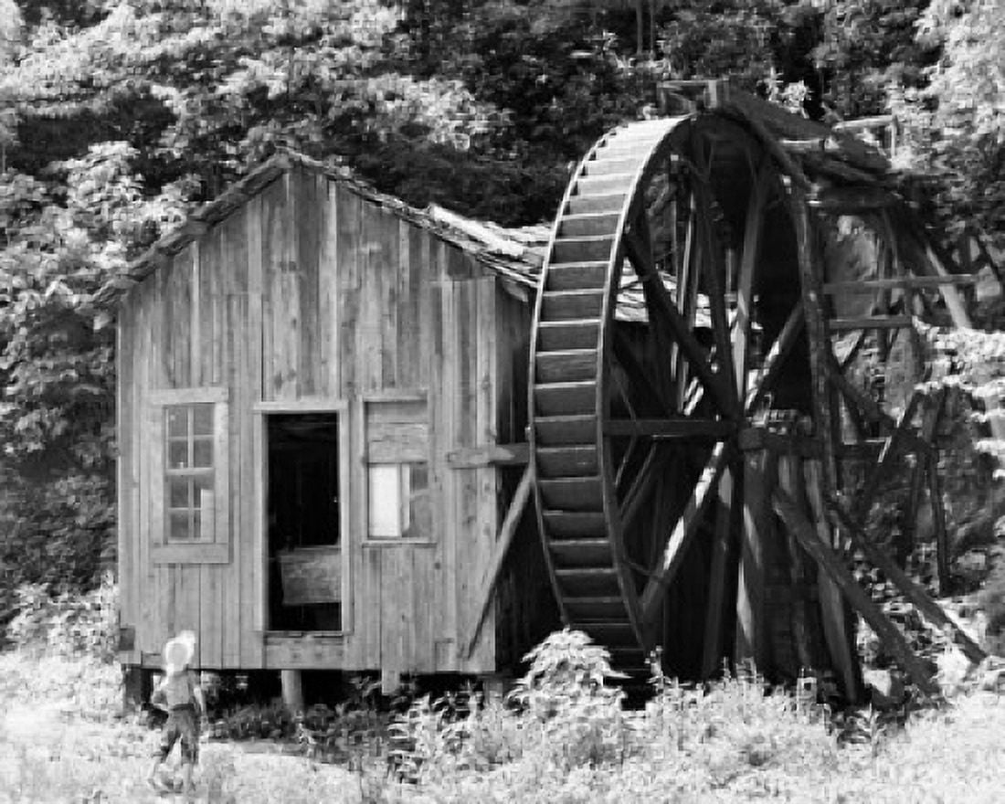 Boy standing in front of a water mill North Carolina USA Canvas Art - (24 x 36)