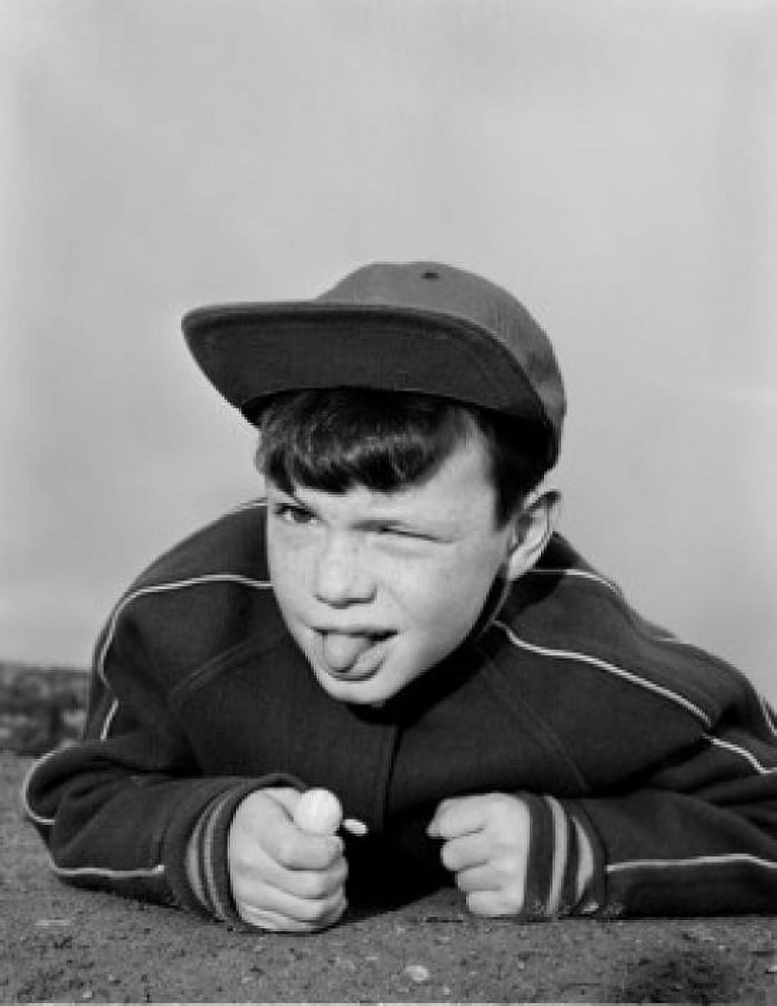 Boy sticking out tongue Canvas Art - (24 x 36)