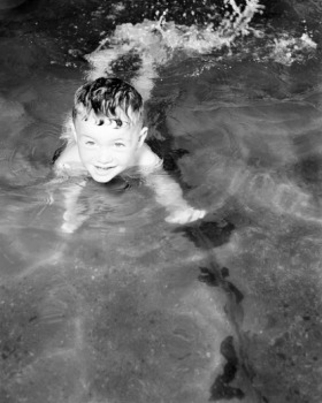 Boy swimming Canvas Art - (18 x 24)