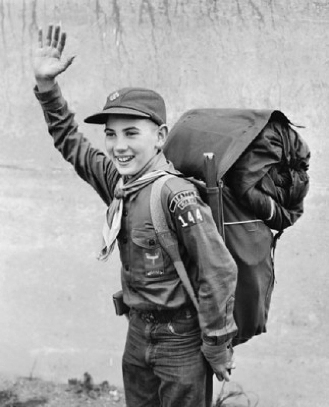 Boy waving his hand and smiling Canvas Art - (18 x 24)