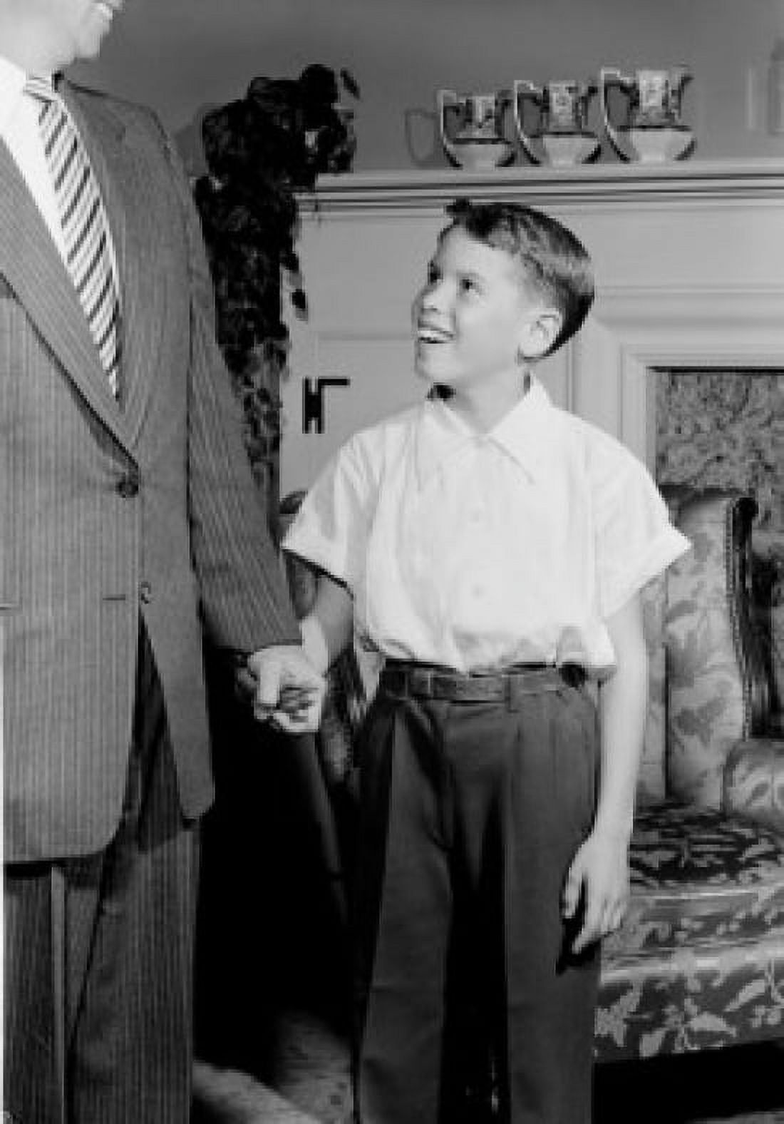 Boy with father in room Canvas Art - (18 x 24)