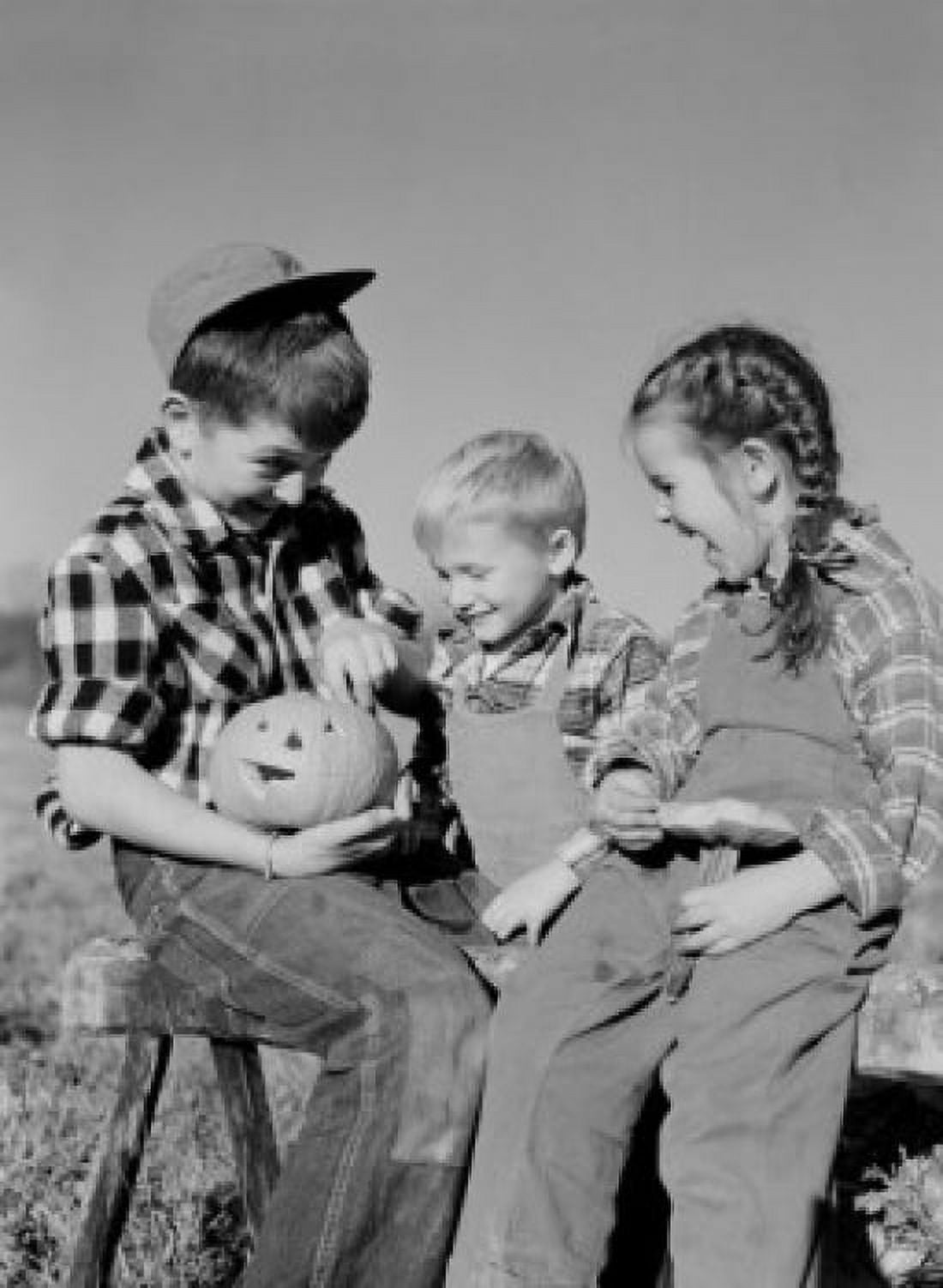 Boys and girl sitting with haloween pumpkin Canvas Art - (24 x 36)