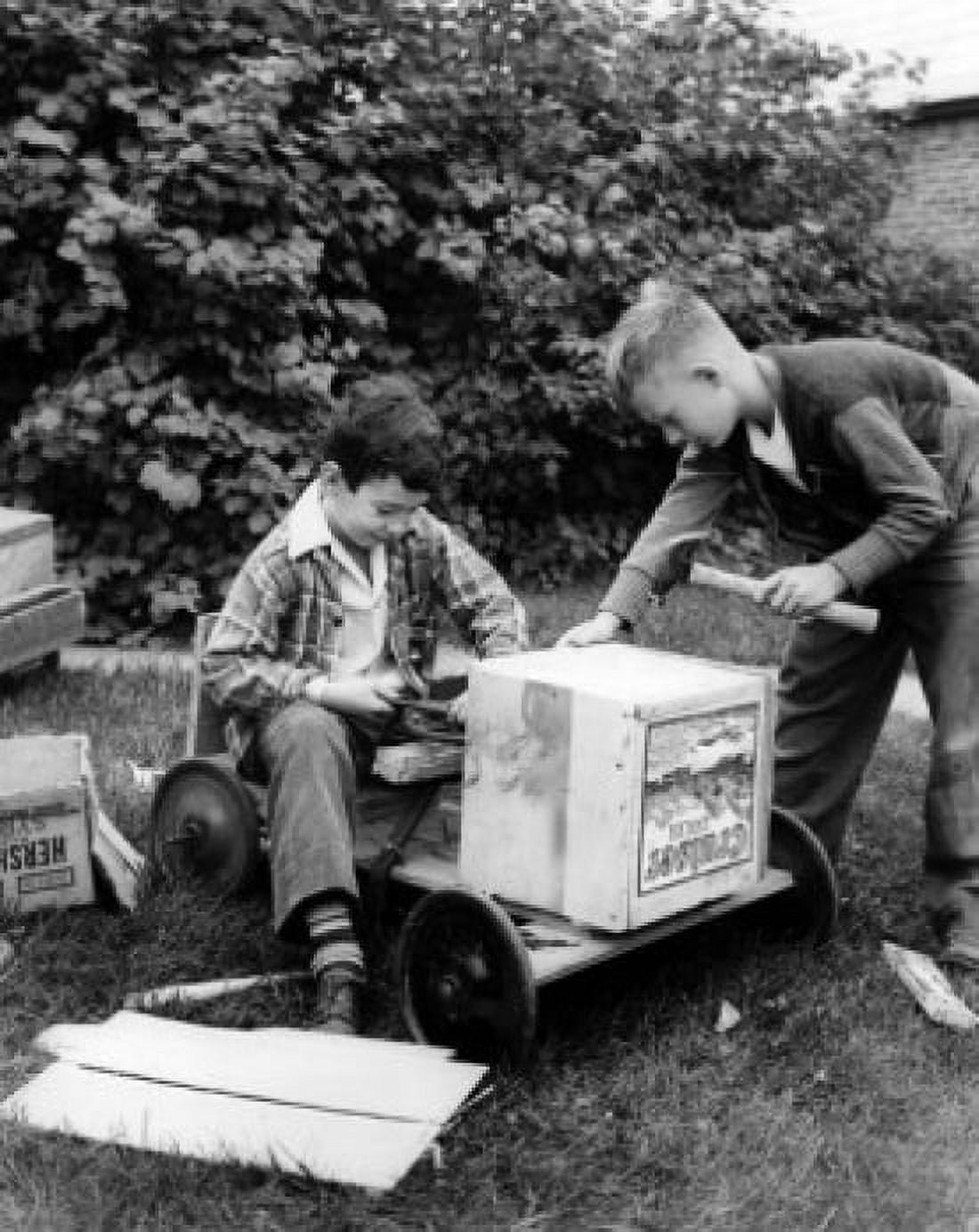 Boys constructing toy car Canvas Art - (18 x 24)