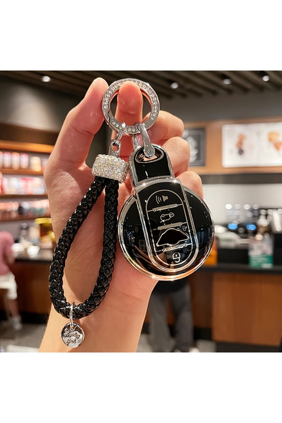 Brand New TPU Key Fob Cover And Keychain for BMW MINI COOPER Models Including S, ONE, JCW, F54, F55, F56, F57, F60, CLUBMAN, And COUNTRYMAN. This Key Case Protector Comes with a Car Keychain Buckle