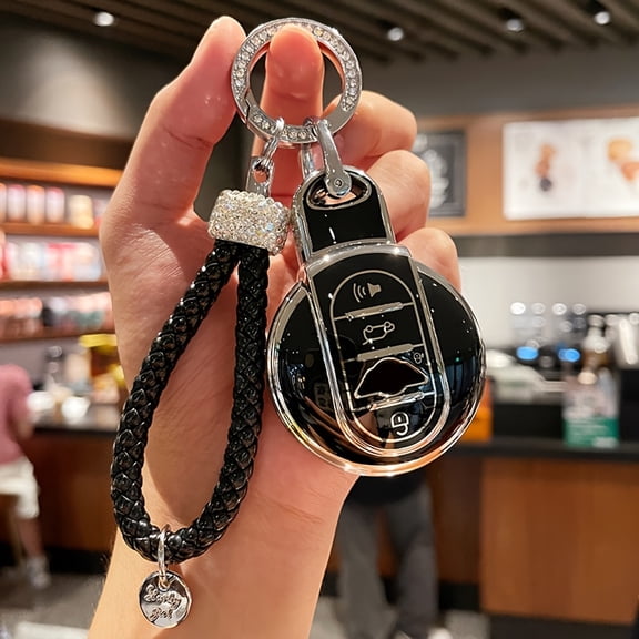 Brand New TPU Key Fob Cover And Keychain for BMW MINI COOPER Models Including S, ONE, JCW, F54, F55, F56, F57, F60, CLUBMAN, And COUNTRYMAN. This Key Case Protector Comes with a Car Keychain Buckle
