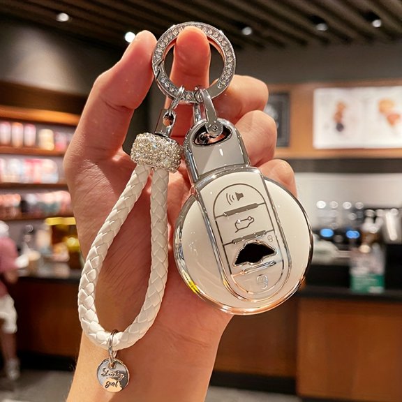 Brand New TPU Key Fob Cover And Keychain for BMW MINI COOPER Models Including S, ONE, JCW, F54, F55, F56, F57, F60, CLUBMAN, And COUNTRYMAN. This Key Case Protector Comes with a Car Keychain Buckle