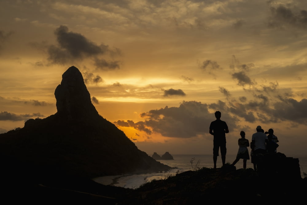 Brazil Pernambuco People admiring sunset over Morro do Pico from Forte dos Remedios Fernando de Noronha Canvas Art - Dosfotos Design Pics (38 x 24)