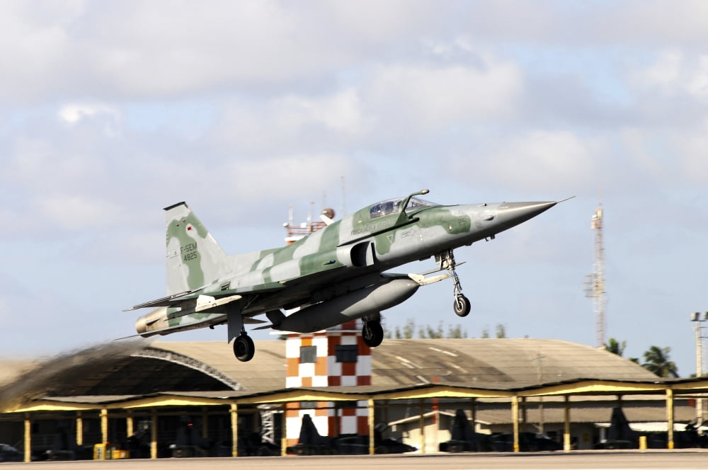 Brazilian Air Force F-5EM taking off from Natal Air Force Base Canvas Art - Riccardo NiccoliStocktrek Images (34 x 23)