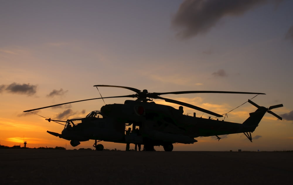 Brazilian Air Force Mi-35 at sunset at Natal Air Force Base Brazil Canvas Art - Giovanni CollaStocktrek Images (36 x 23)