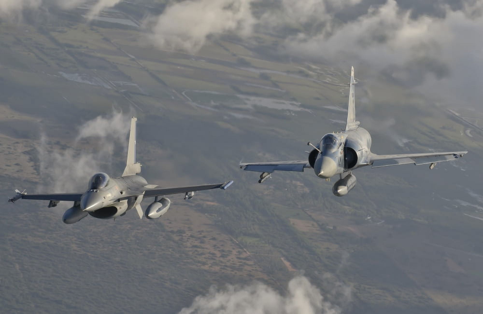 Brazilian Air Force Mirage 2000 and Chilean Air Force F-16 in flight over Brazil Canvas Art - Giovanni CollaStocktrek Images (18 x 12)