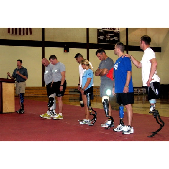 Brian Frasure Paralympian Speaking At A Military Amputees Training Workshop While Flanked By Seven Soldiers Wearing Advanced Artificial Legs. Walter Reed Army Medical Center. June 4 2007
