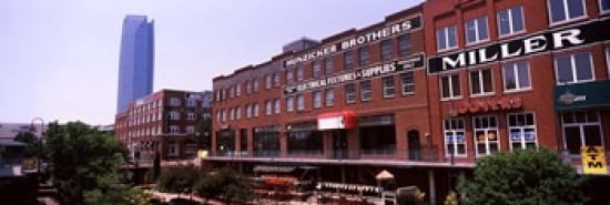 Bricktown Mercantile building along the Bricktown Canal with Devon Tower in background Bricktown Oklahoma City Oklahoma USA Canvas Art - Panoramic Images (36 x 12)