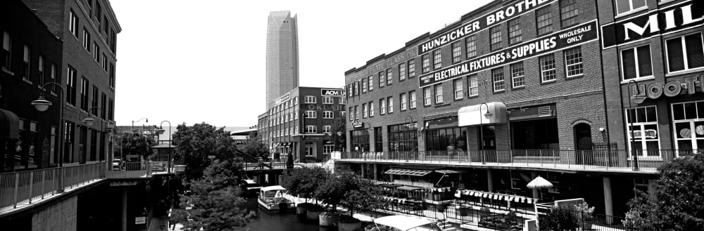 Bricktown Mercantile building along the Bricktown Canal with Devon Tower in background Bricktown Oklahoma City Oklahoma USA Canvas Art - Panoramic Images (6 x 18)
