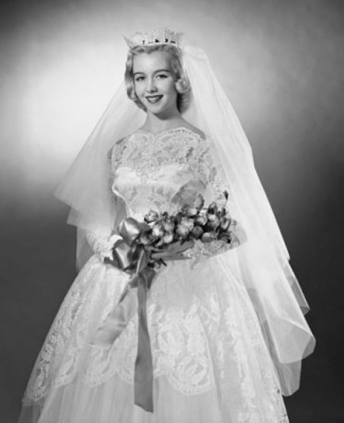 Bride holding a bouquet of flowers and smiling Canvas Art - (18 x 24)