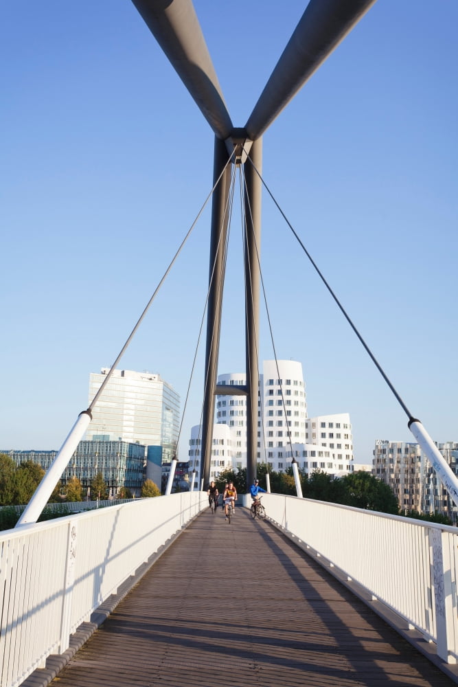 Bridge with Neuer Zollhof buildings designed by Frank Gehry Media Harbour Dusseldorf North Rhine Westphalia Germany Canvas Art - Panoramic Images (36 x 12)
