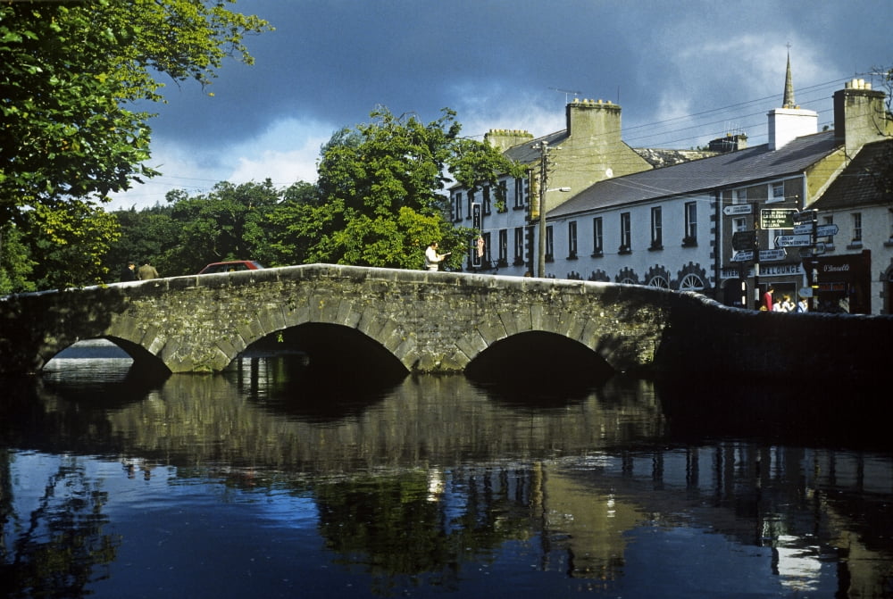 Bridge Over A River In Front Of Buildings The Mall Westport County Mayo Republic Of Ireland Canvas Art - The Irish Image Collection Design Pics (18 x 12)