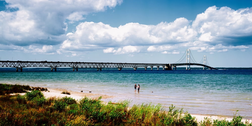 Bridge across a lake Mackinac Bridge Mackinaw City Michigan USA Canvas Art - Panoramic Images (12 x 24)
