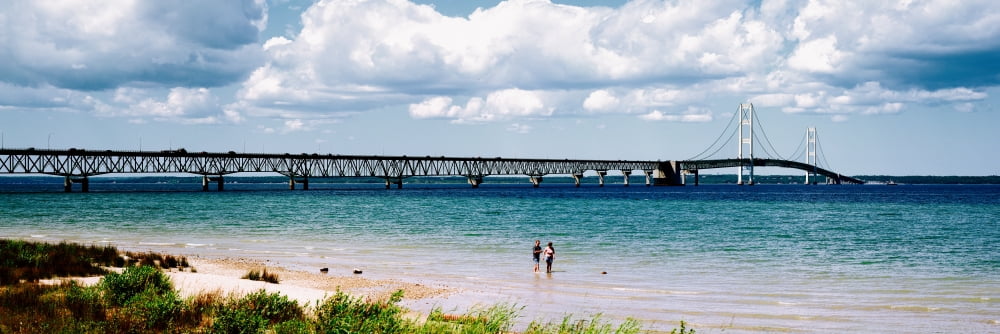 Bridge across a lake Mackinac Bridge Mackinaw City Michigan USA Canvas Art - Panoramic Images (36 x 12)