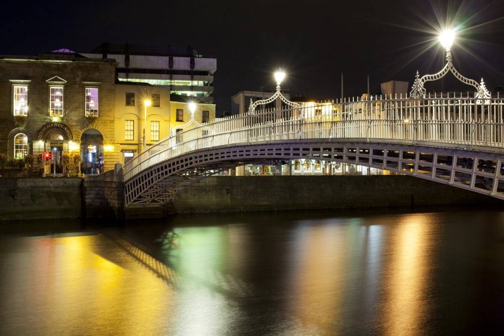 Bridge across a river at night Hapenny Bridge Liffey River Dublin Leinster Province Republic of Ireland Canvas Art - Panoramic Images (36 x 12)