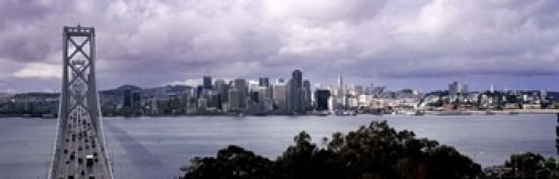 Bridge across a bay with city skyline in the background Bay Bridge San Francisco Bay San Francisco California USA Canvas Art - Panoramic Images (18 x 6)