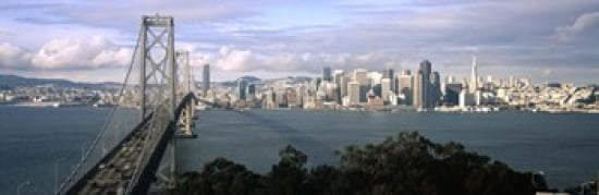 Bridge across a bay with city skyline in the background Bay Bridge San Francisco Bay San Francisco California USA Canvas Art - Panoramic Images (36 x 12)