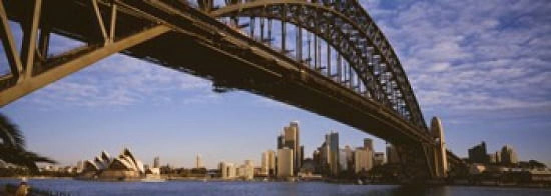 Bridge across the bay with skyscrapers in the background Sydney Harbor Bridge Sydney New South Wales Australia Canvas Art - Panoramic Images (18 x 7)