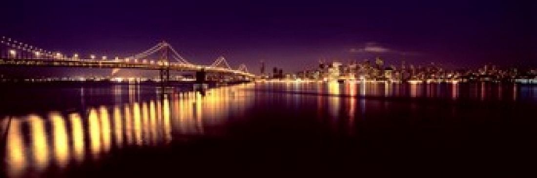 Bridge lit up at night Bay Bridge San Francisco Bay San Francisco California USA Canvas Art - Panoramic Images (18 x 7)