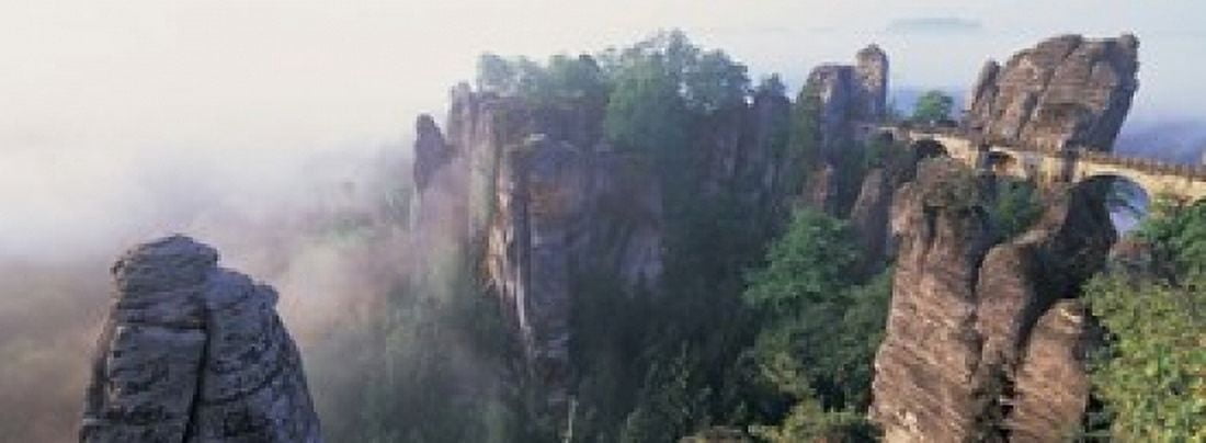 Bridge passing through cliffs Bastei Bridge Saxon Switzerland National Park Dresden Saxony Germany Canvas Art - Panoramic Images (18 x 7)