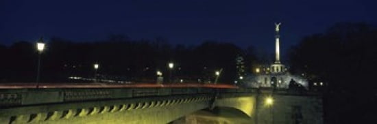 Bridge with a monument lit up at night Friedensengel Munich Bavaria Germany Canvas Art - Panoramic Images (36 x 12)