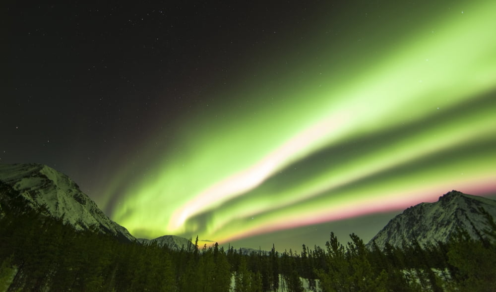 Bright aurora borealis Annie Lake Yukon Canada Canvas Art - Philip HartStocktrek Images (18 x 11)