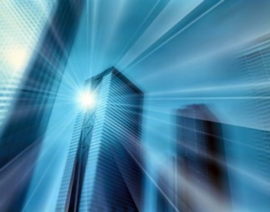 Bright ball of light radiating rays of light in front of out of focus sky scrapers Canvas Art - Panoramic Images (36 x 29)