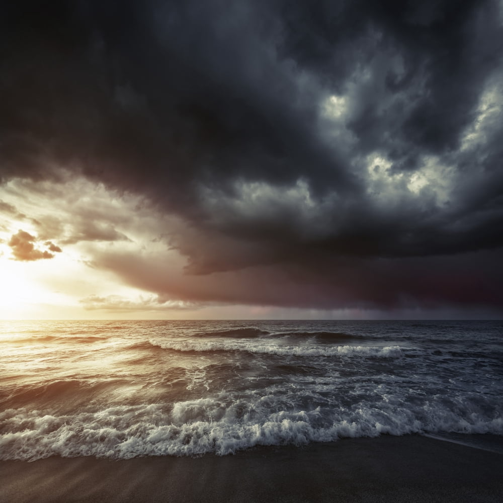 Bright sunset against a wavy sea with stormy clouds Hersonissos Crete Canvas Art - Evgeny KuklevStocktrek Images (29 x 29)