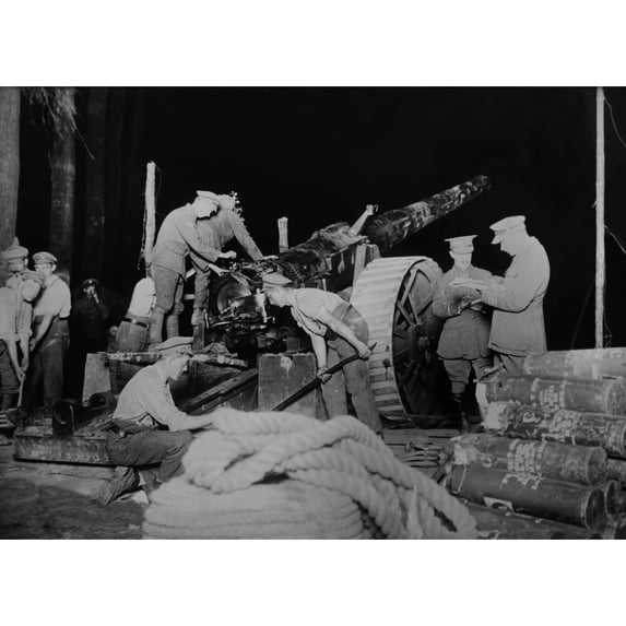 British Soldiers Getting Artillery In Position At Night During World War 1. Artillery Was Often Moved To New Positions