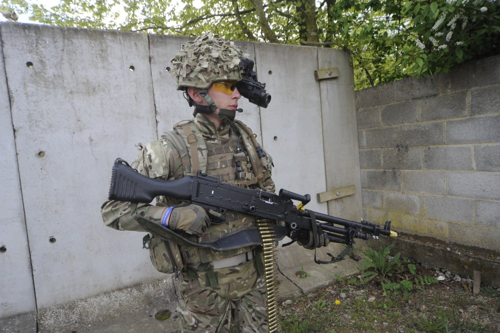 British soldier equipped with night vision and a machine gun Canvas Art - Andrew ChittockStocktrek Images (34 x 23)