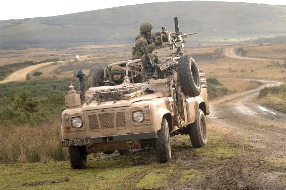 British soldiers operate a Pink Panther Land Rover of the British Army Canvas Art - Andrew ChittockStocktrek Images (17 x 12)